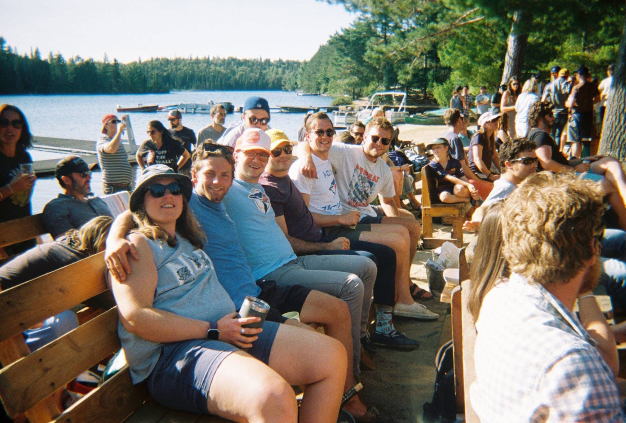 Guests enjoying the September Camp Auction on the waterfront at Camp Ahmek