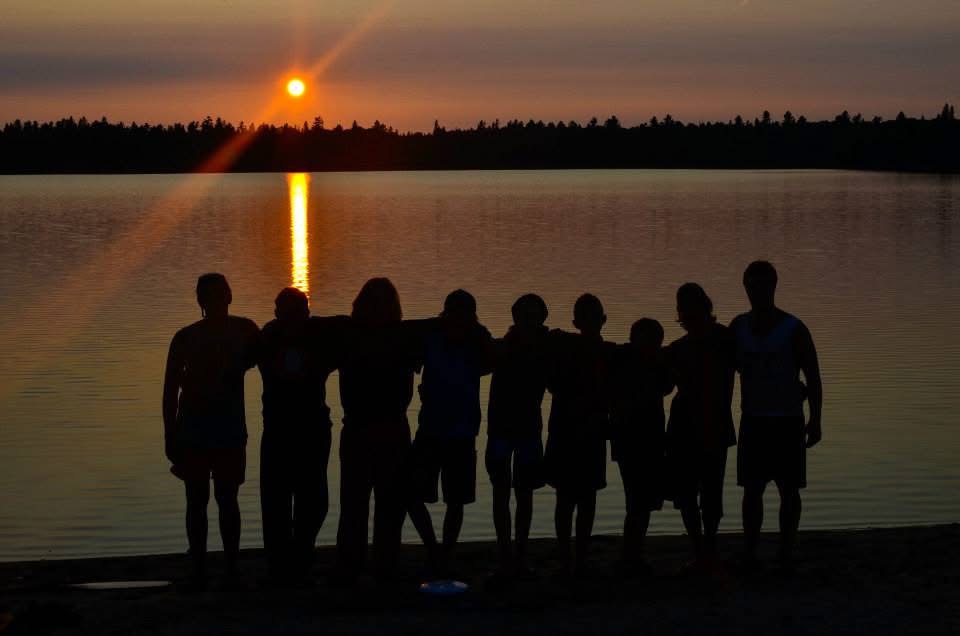Sunset over a lake at summer camp